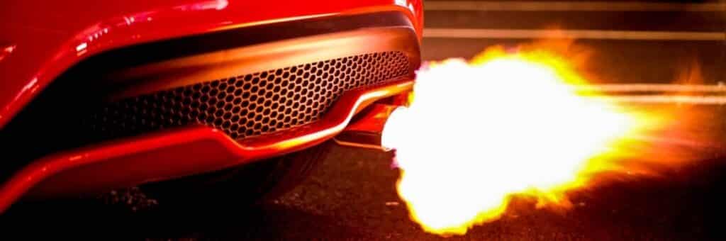 Muffler on a red car shooting flames