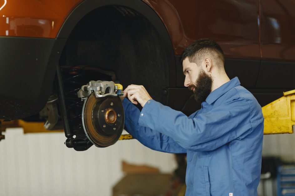 mechanic fixing brakes